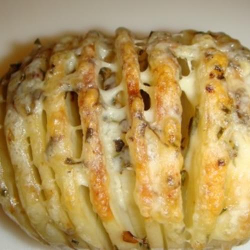 Sliced Baked Potatoes with Herbs and Cheese