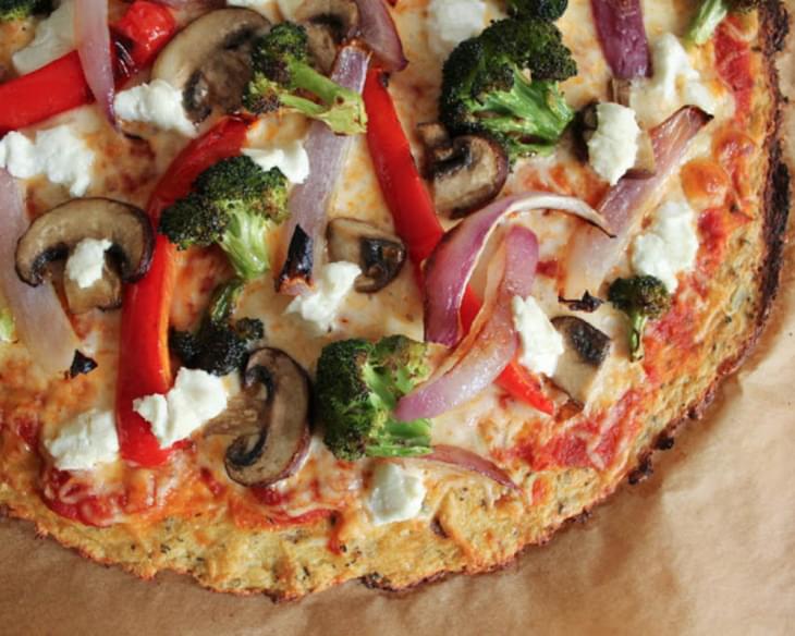 Cauliflower Pizza Crust with Roasted Vegetables and Goat Cheese