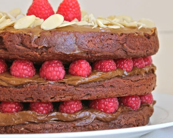 Triple Layered Chocolate Cake with Thick Frosting & Fresh Raspberries