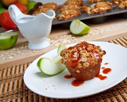 Cheesecake Stuffed Apple Muffins with Streusel Topping and Caramel Sauce