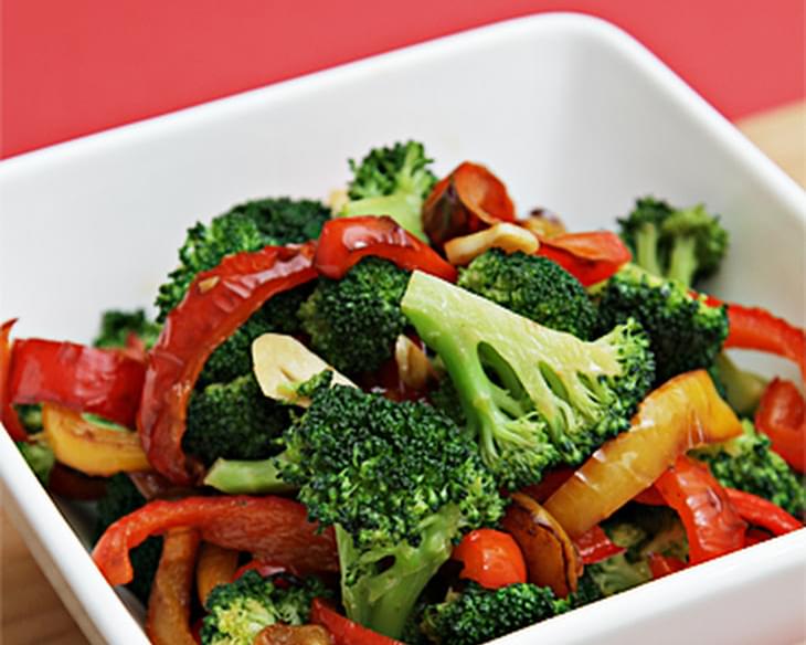 Sauteed Broccoli With Yellow And Red Bell Peppers
