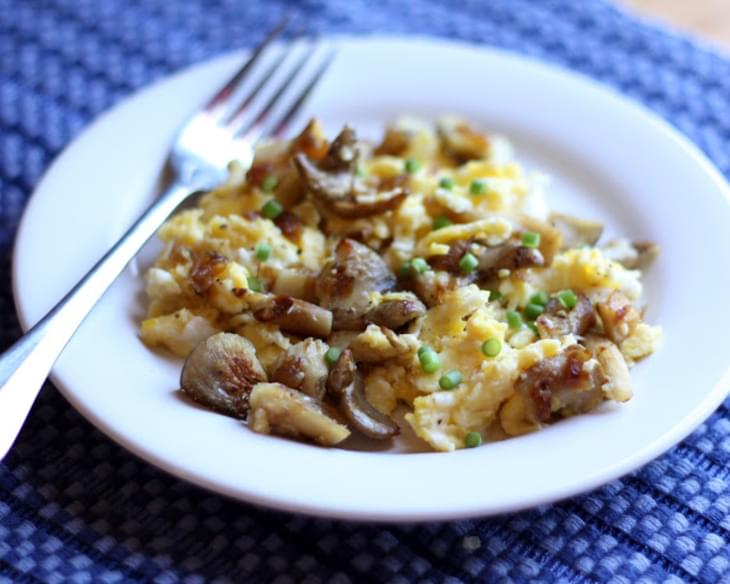 Scrambled Eggs with Oyster Mushrooms, Caramelized Onions and Garlic Scapes