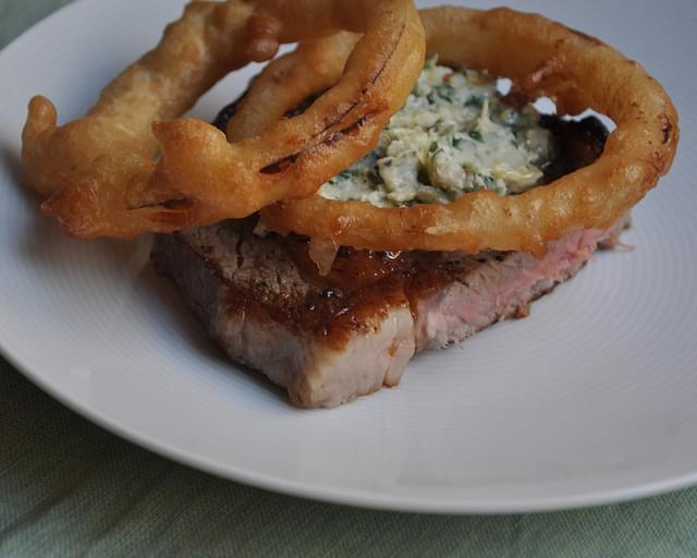 Rib-Eye Steak with Blue Cheese Butter and Fried Onion Rings
