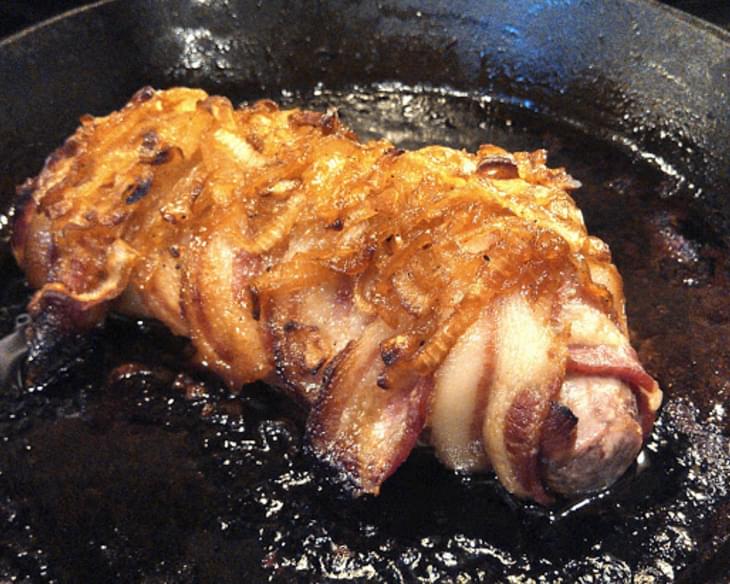 Bacon Wrapped Pork Tenderloin Topped With Candied Onions