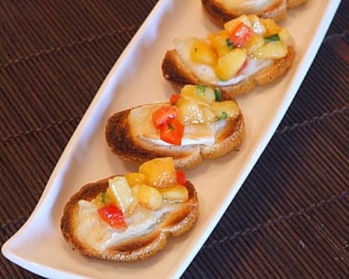 Bruschetta with Peach Salsa and Melted Brie