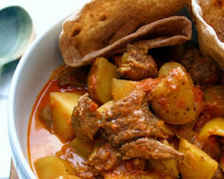 Slow Cooked Beef And Potato Curry With Homemade Chapati