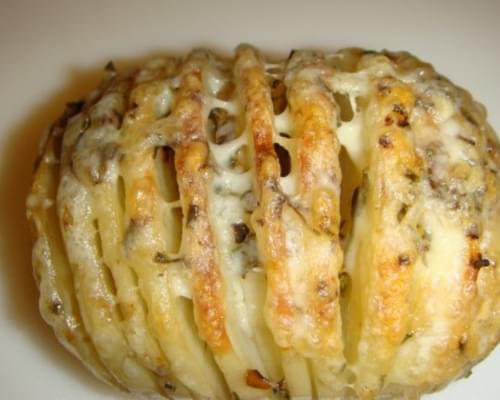 Sliced Baked Potatoes with Herbs and Cheese