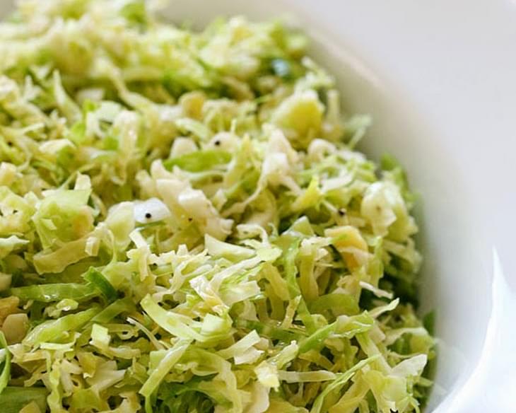 Raw Shredded Brussels Sprouts with Lemon and Oil