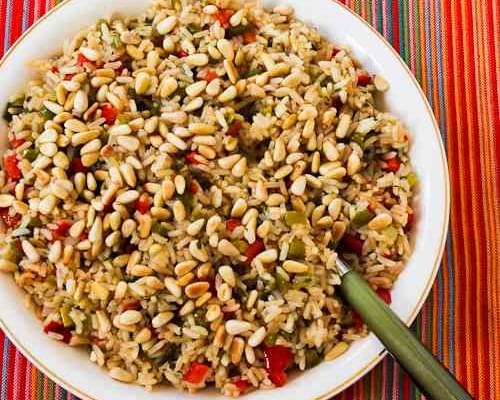 Red and Green Christmas Rice with Bell Peppers, Parmesan, and Pine Nuts