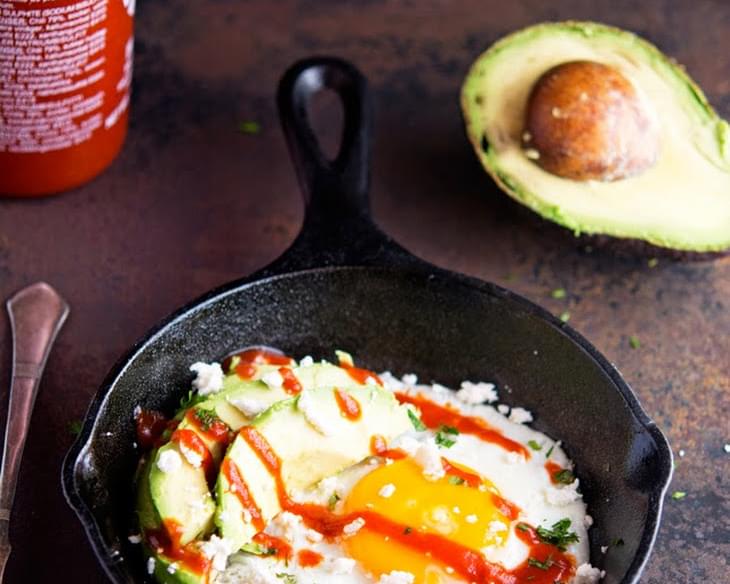 Sunny-Side Up Egg with Avocado, Sriracha and Crumbled Feta