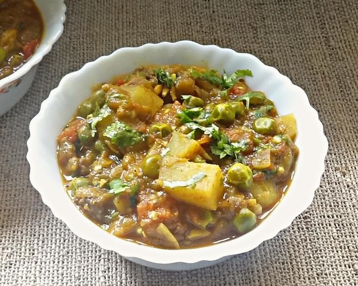 Eggplant, potatoes and green peas curry recipe - Aloo Baingan Matar ki sabji