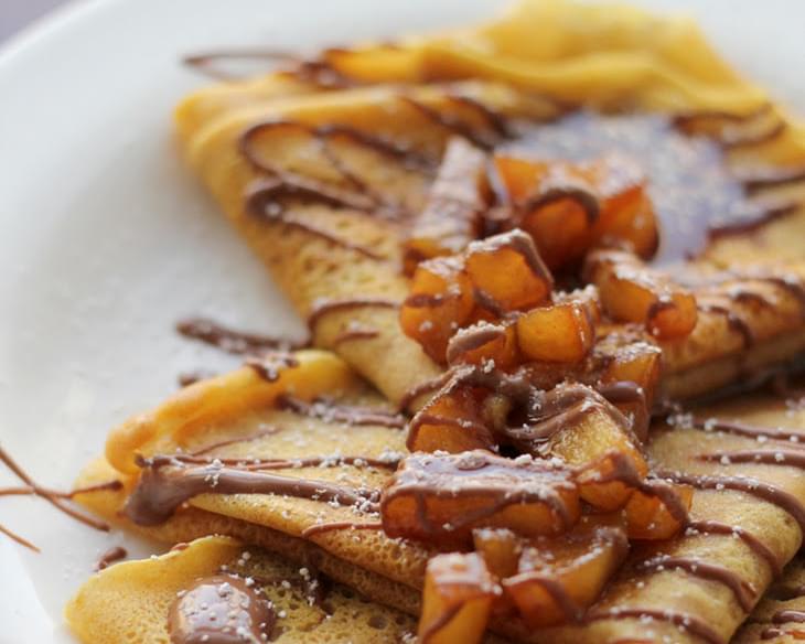 Pumpkin Crepes with Beer and Cinnamon Apples and a Chocolate Drizzle