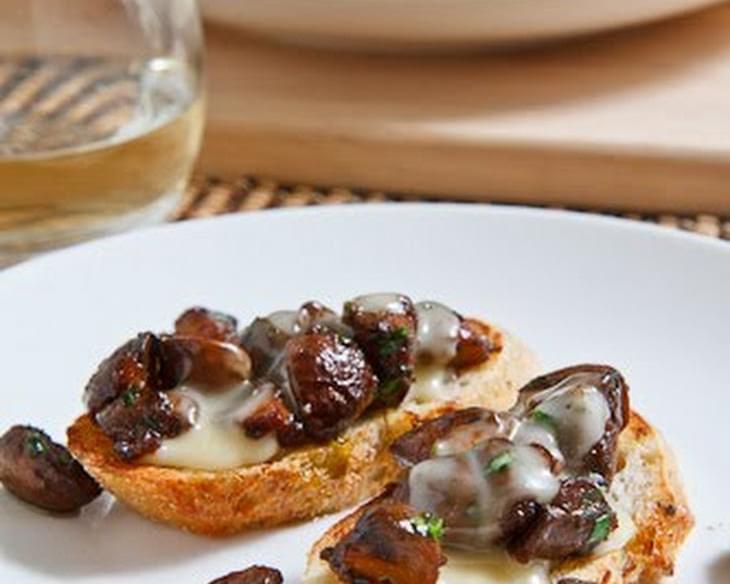 Baked Brie Topped with Caramelized Mushrooms