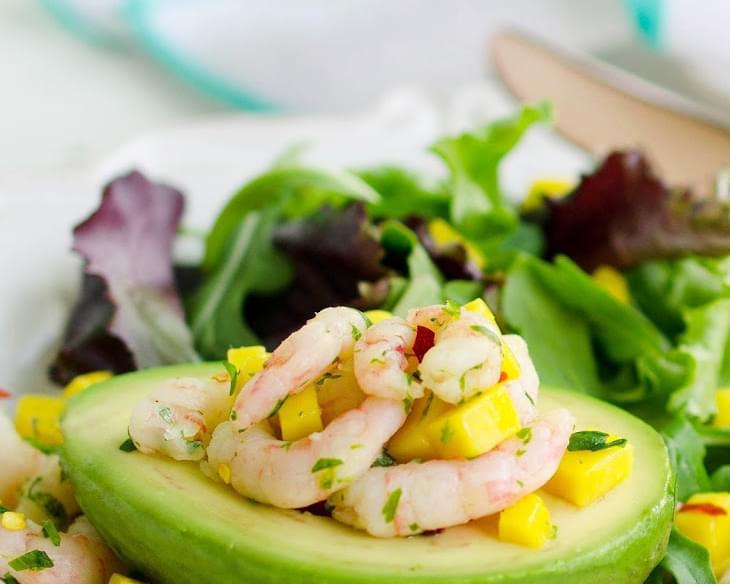 Avocado Stuffed with Spicy Shrimp Over Spring Greens