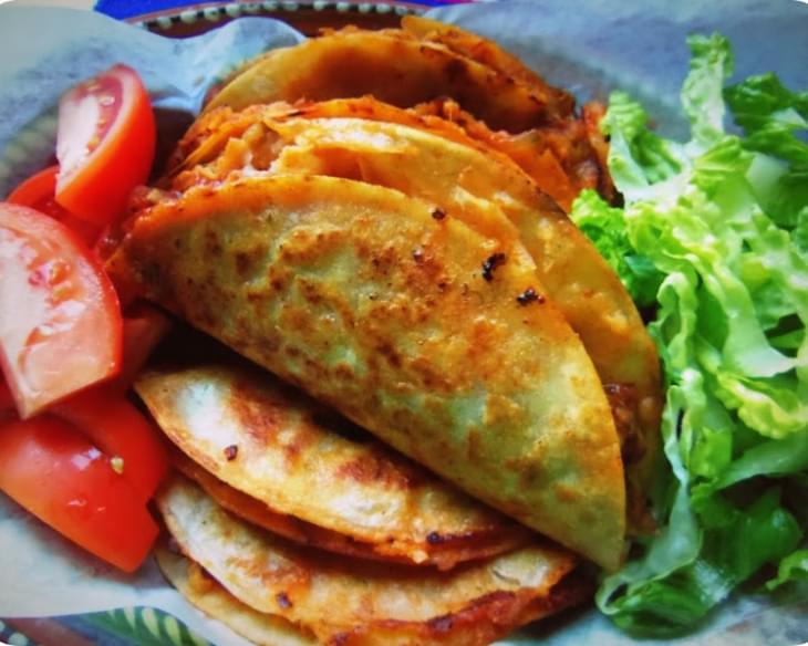 Tacos de Canasta Filled with Spicy Potatoes and Cheese
