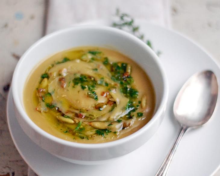Potage Parmentier or Potato Leek Soup with Toasted Pepitas and Herbs