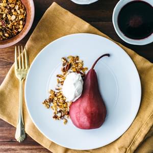 Poached Pears with Pecan Granola and Whipped Cream