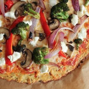Cauliflower Pizza Crust with Roasted Vegetables and Goat Cheese