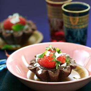 Dark Chocolate Tartlets with Strawberries and Coconut Shaves