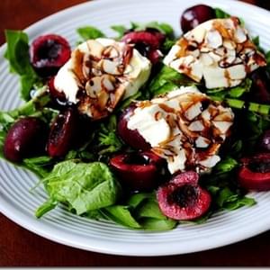 Almond-Crusted Warm Goat Cheese Spinach Salad with Cherries