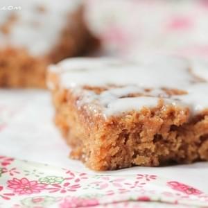 Cinnamon Roll Swirled Gingerbread Bars with Toffee Chips