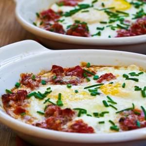 Tuscan Baked Eggs with Tomatoes, Red Onion, Garlic, Parmesan, and Herbs