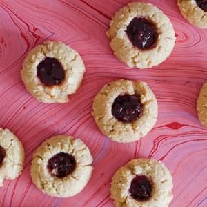 Peanut Butter and Jelly Thumbprint Cookies Rolled in Crushed Potato Chips