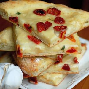 White Pizza With Roasted Garlic Coconut Cream And Sun Dried Tomatoes