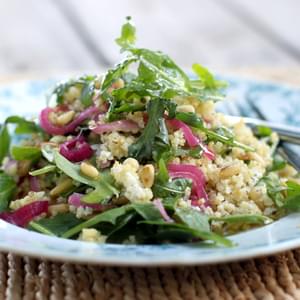 Toasted Millet Salad with Arugula, Quick Pickled Onions, and Goat Cheese