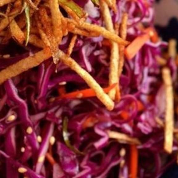 Red Cabbage Salad with Crispy Spring Onions and Potato Sticks