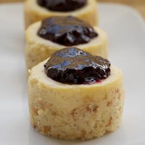 Vanilla Bean Mini Cheesecakes with Blueberry Sauce