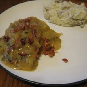 Smothered Pork Chops Braised in Cider With Apples
