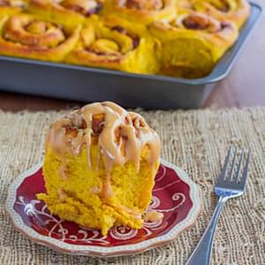 Pumpkin Sweet Rolls with Cranberries and Pecans and Caramel Cream Cheese Icing