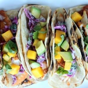 Grilled Chili-Lime Fish Tacos with Sour Cream Cabbage Slaw + Mango & Avocado