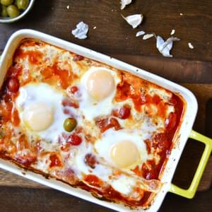 Baked Feta with Olives, Tomatoes and Eggs