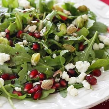 Arugula with Pomegranates, Blue Cheese and Pistachios