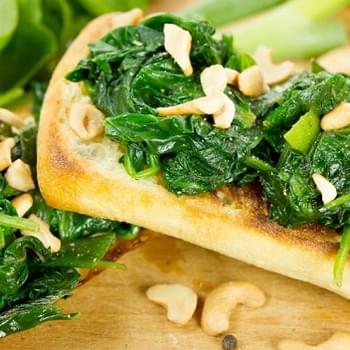 Vegetarian Crostini with Garlic Buttered Spinach, Lemon and Cashew Nuts