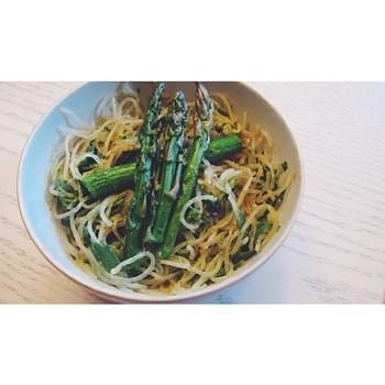 Kelp Noodles And Asparagus Tossed With Garlic, Pesto, Basil, And Avocado
