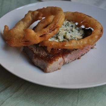 Rib-Eye Steak with Blue Cheese Butter and Fried Onion Rings