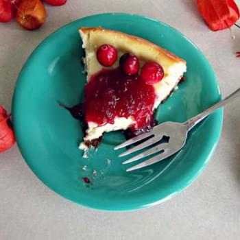 Orange Spice Cheesecake With Gingersnap Crust And Cranberry Topping