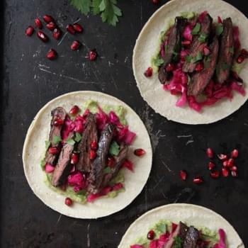 Pomegranate Glazed Skirt Steak Tacos with Pickled Red Cabbage and Spicy Guacamole