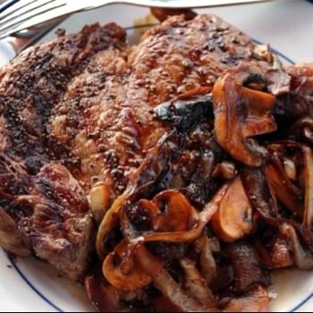 Ribeye Steak with Espresso Balsamic, Caramelized Onions & Mushrooms Recipe - EVOO Market Fort Lauderdale