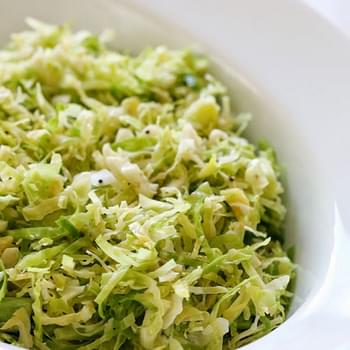 Raw Shredded Brussels Sprouts with Lemon and Oil