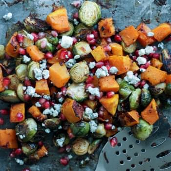 Garlic Chili-Maple Roasted Butternut Squash & Brussels Sprouts with Pomegranate + Gorgonzola