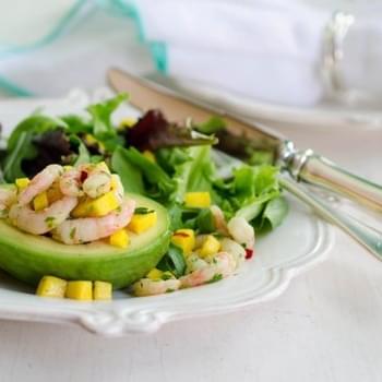 Avocado Stuffed with Spicy Shrimp Over Spring Greens