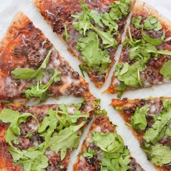 Caramelized Onion and Sausage Pizza with Arugula