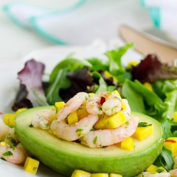 Avocado Stuffed with Spicy Shrimp Over Spring Greens