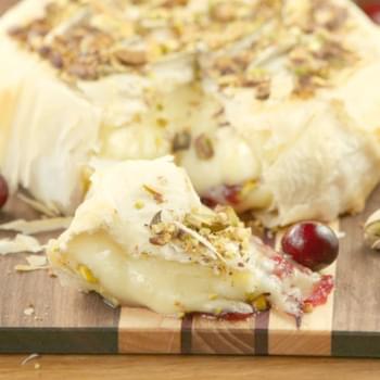 Cranberry Pistachio Stuffed Brie Wrapped in Phyllo