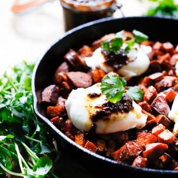 Harissa Sweet Potato Hash with Poached Eggs and Merguez Sausage